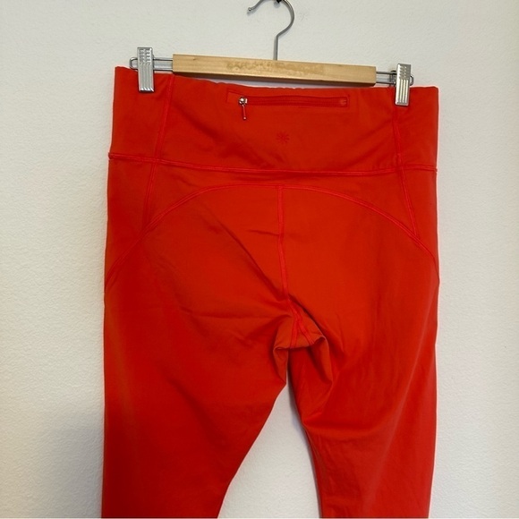 Athleta Peloton Velocity Ankle Leggings Orange Size Large Women’s Side Pockets - Picture 6 of 9